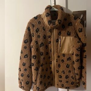 a very cute and comfy sherpa jacket! (light brown and back -cheetah print spots)